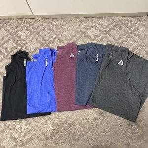 Reebok Lot of workout tanks. High neckline. Size large.